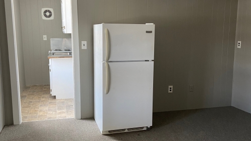 Living room with Refrigerator 