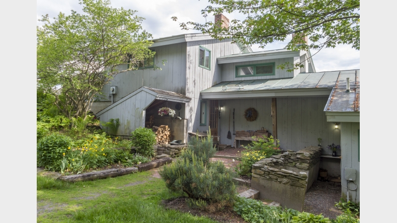 Front entrance to house and apartment (on right)