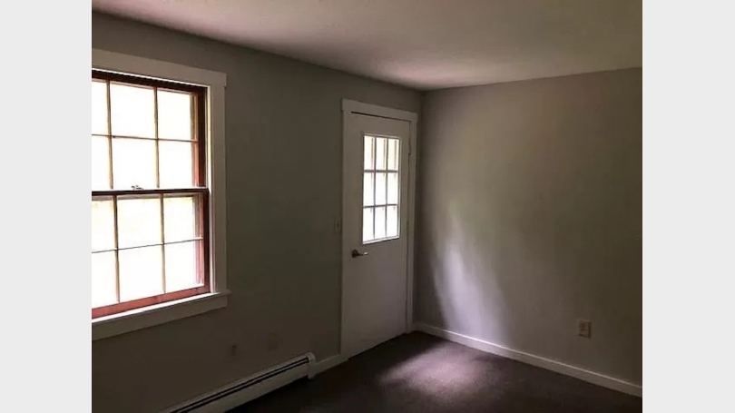 Rear bedroom door to outside deck area