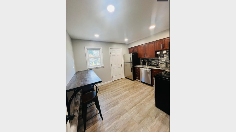Kitchen different angle + dining table