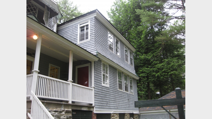 Apartment entry Exterior image of the rental property includes porch