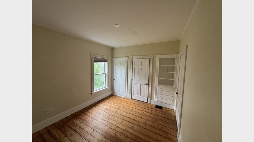 Bedroom 1 with ensuite half bath and walk-in closet